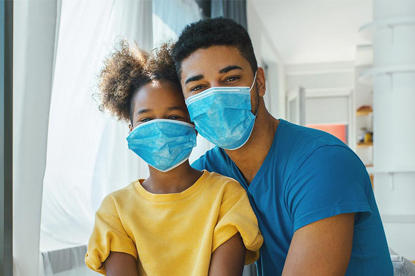 Doctor and patient with masks on